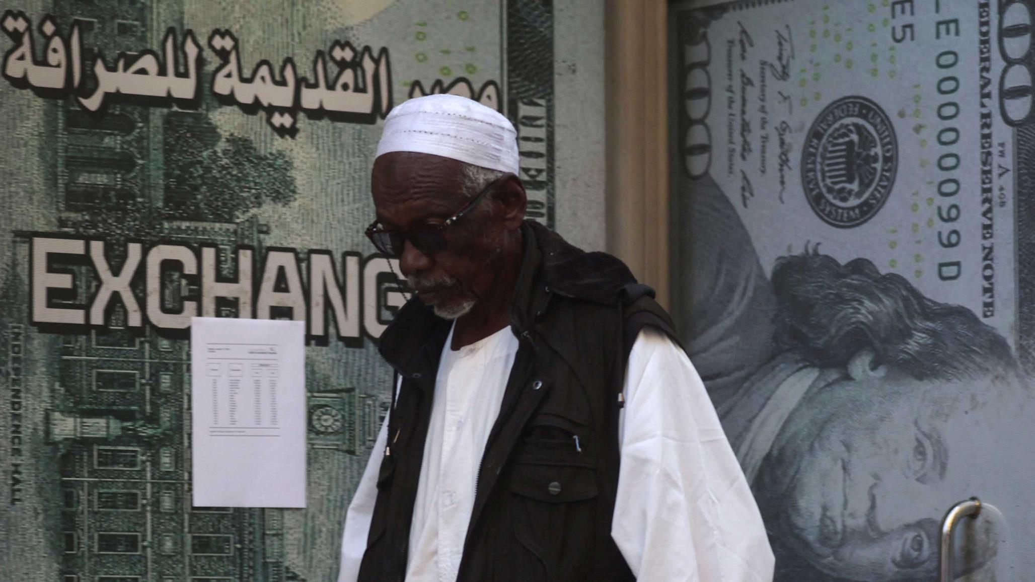 A man walks in front of a currency exchange office in Cairo, Egypt, on January 17, 2023. 