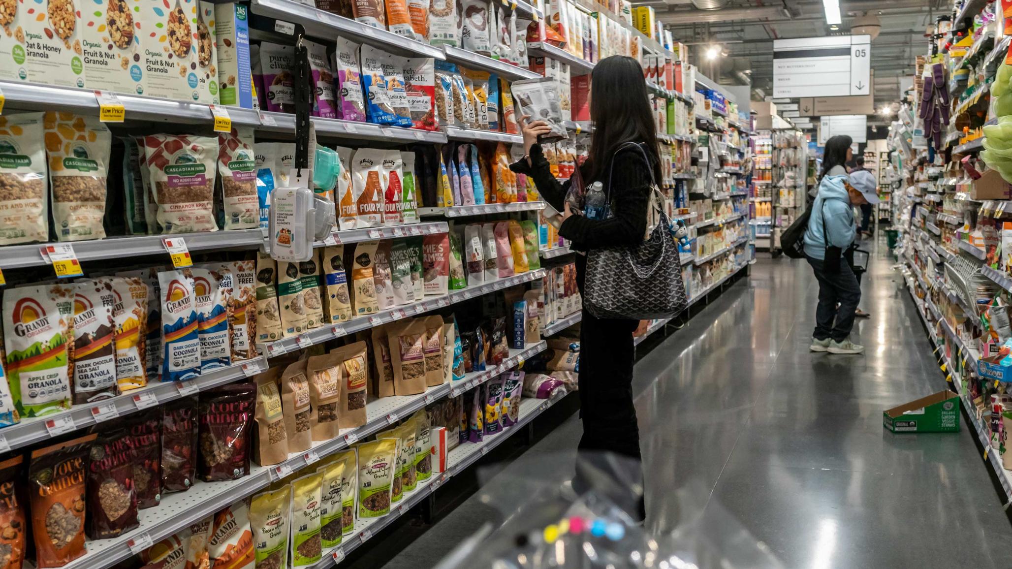 Shopping in a Whole Foods Market supermarket in New York on Wednesday, September 26, 2024. With the Fed reducing interest rates analysts are predicting that the era of high inflation is finally coming to a close. 