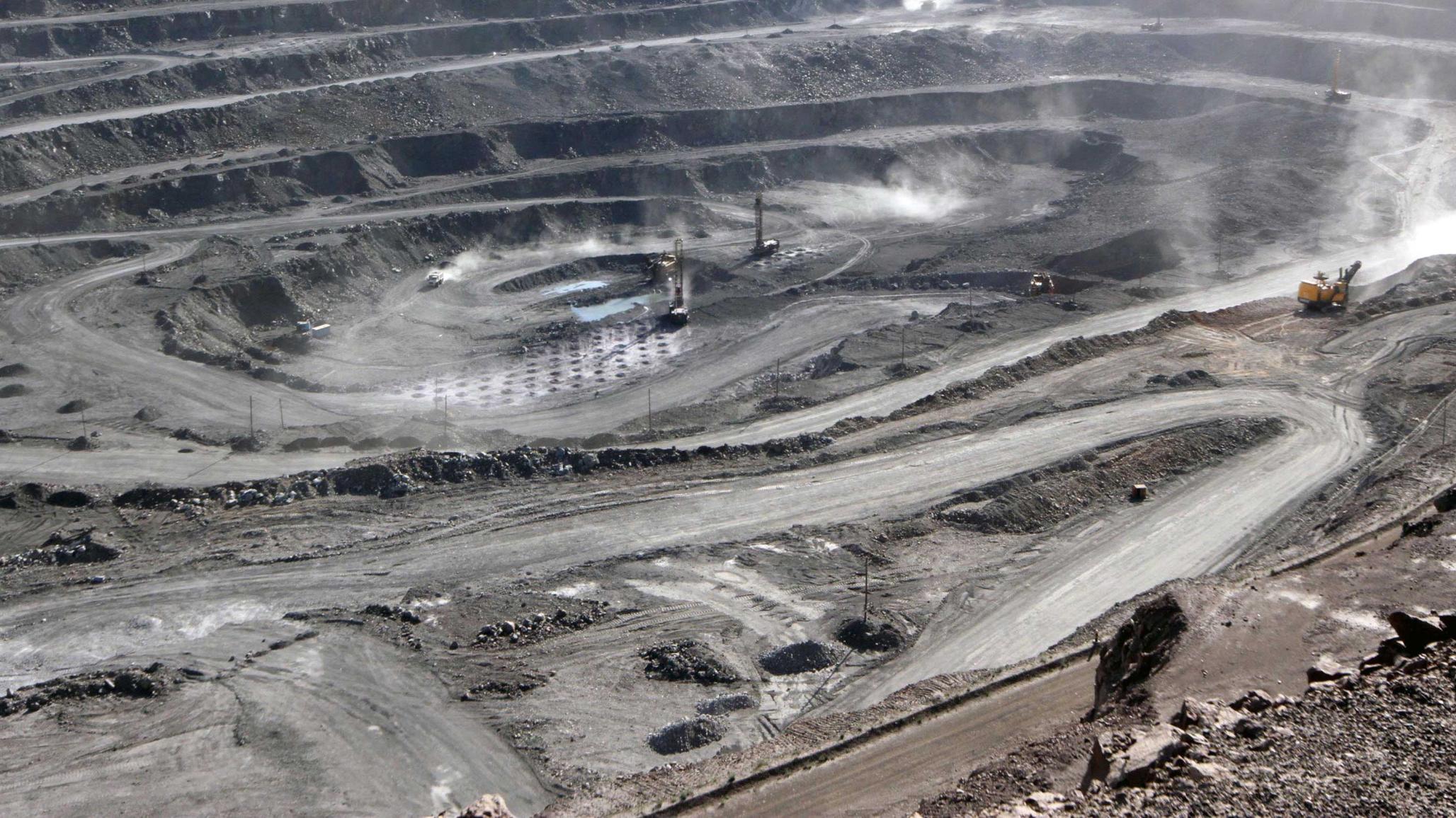 Miners work at a mine containing rare earth minerals, in Inner Mongolia, China. 