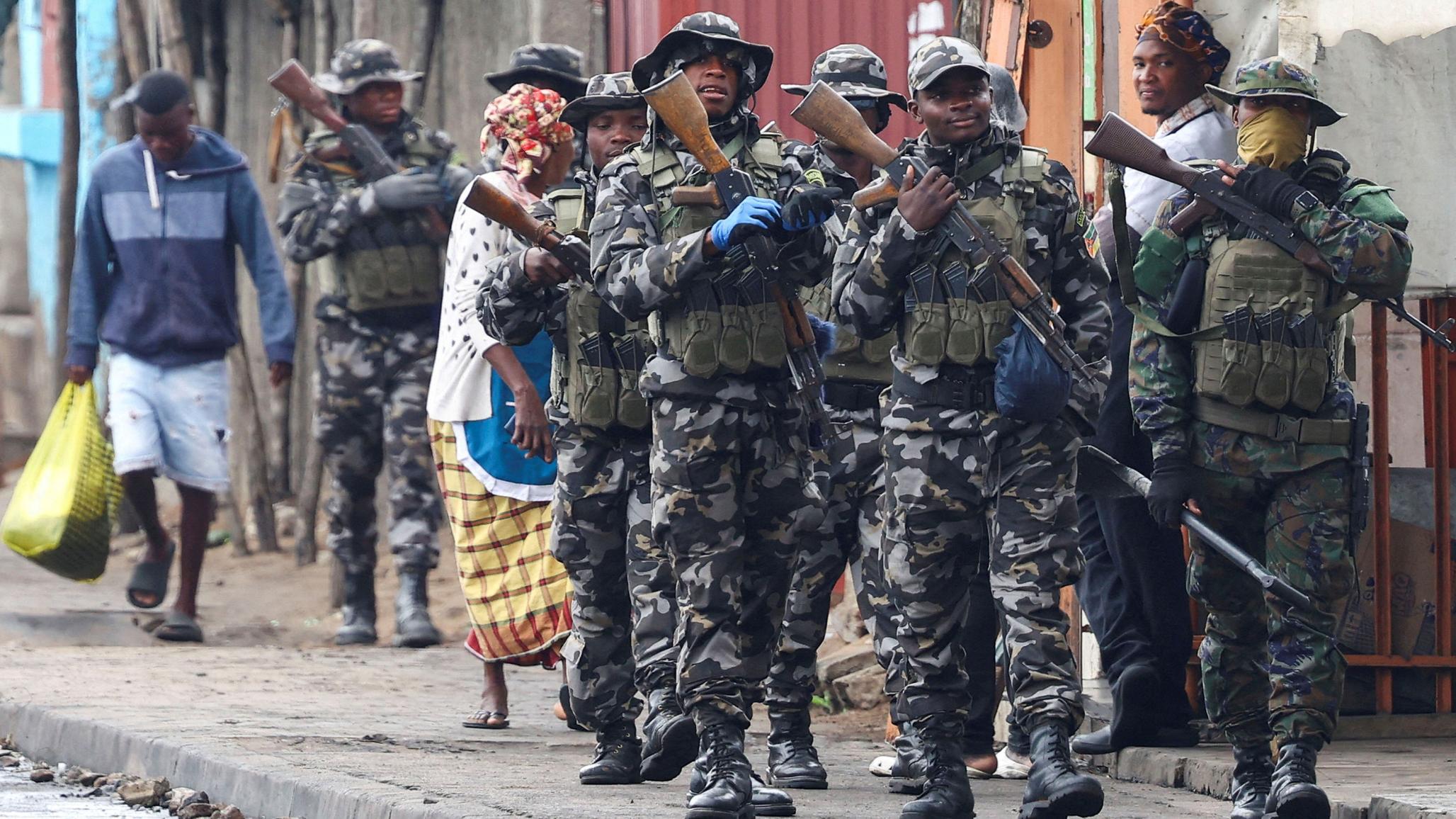 Members of the Mozambique military patrol the streets of the capital. November 8, 2024.