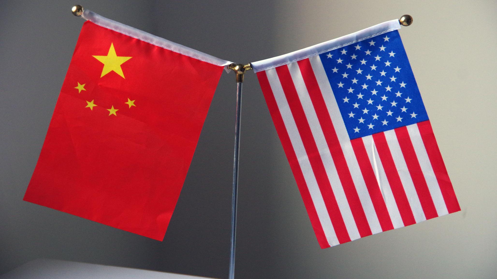 National flags of China and the US are displayed in Ji'nan city, east China's Shandong province, China. 