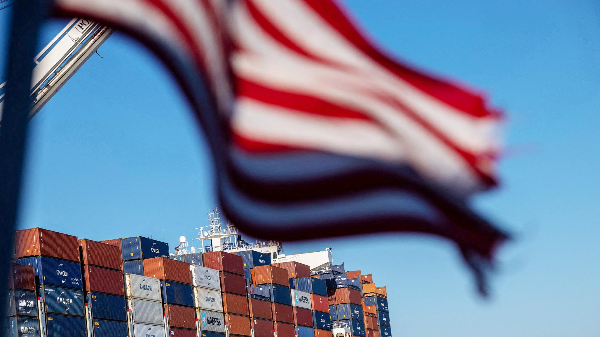 A cargo ship full of shipping containers is seen at the port of Oakland, California, on August 4, 2025. 