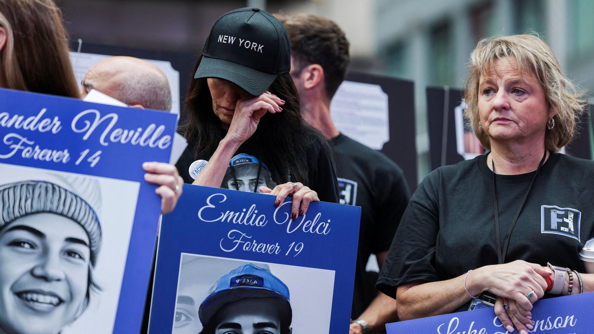 eople react during the Fourth Annual National Fentanyl Prevention and Awareness Day event in Times Square, New York City on August 21, 2025