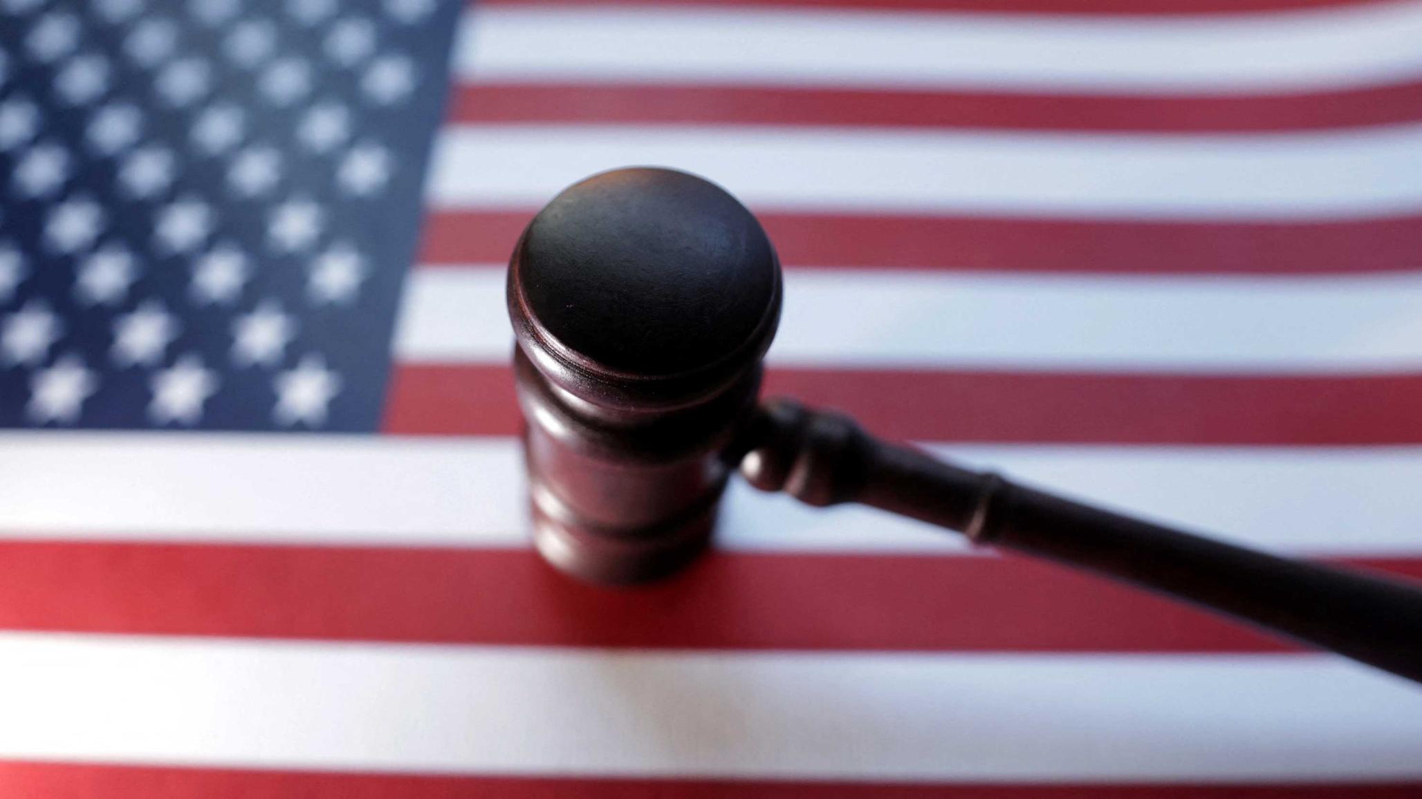 US flag and Judge gavel are seen in this photo illustration. 