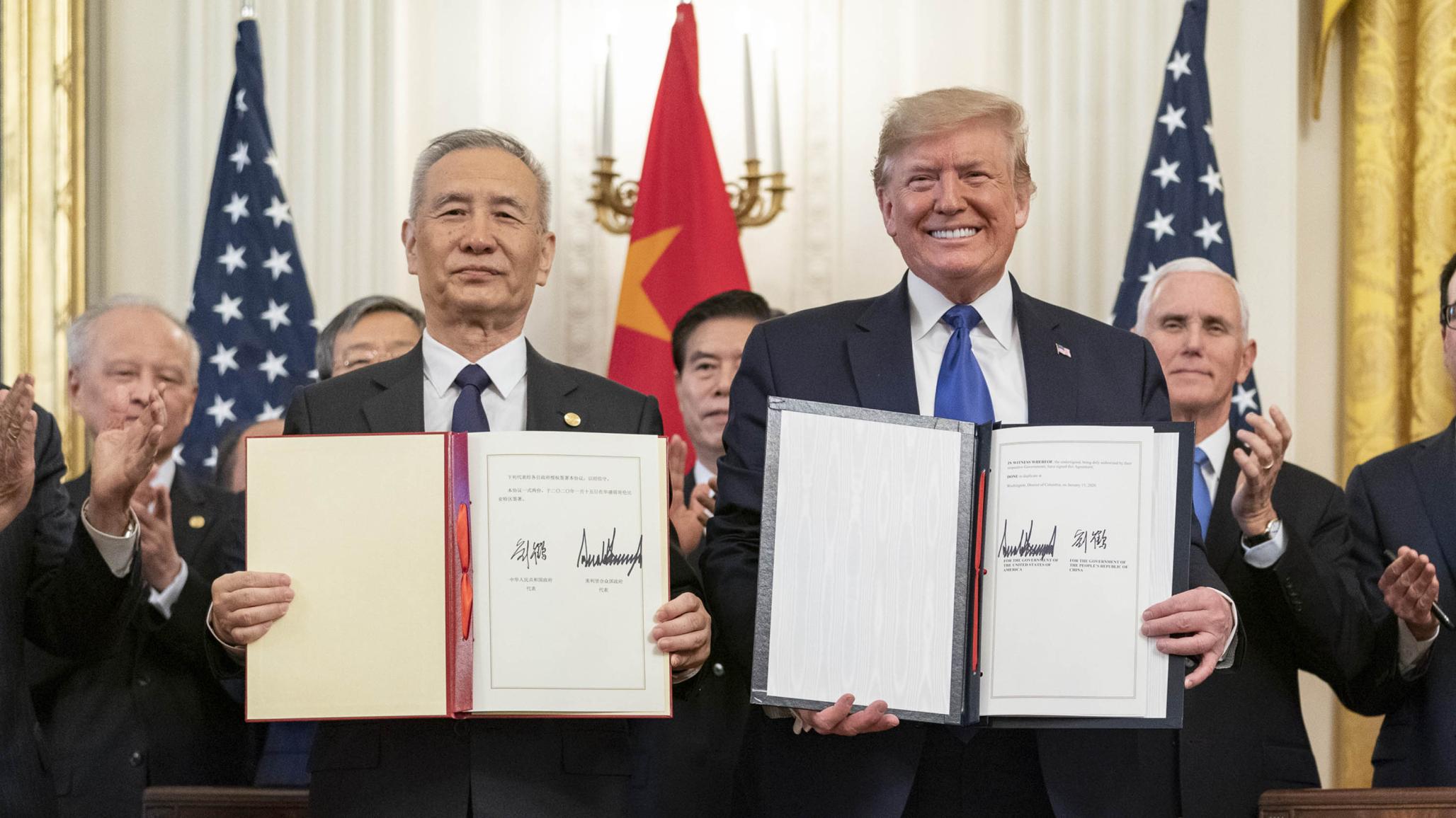 President Donald J. Trump, joined by Chinese Vice Premier Liu He, sign the U.S. China Phase One Trade Agreement Wednesday, Jan. 15, 2020, in the East Room of the White House.